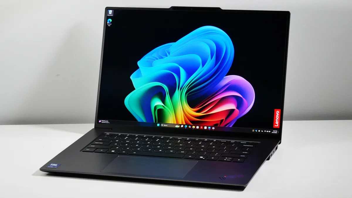 لپتاپ Lenovo ThinkPad X9 Aura Edition باز شده با صفحهنمایش روشن و طراحی حرفهای